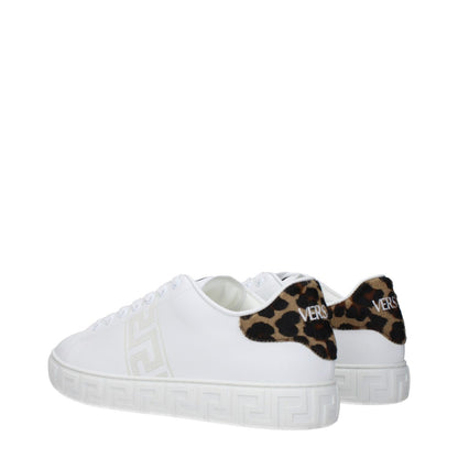 Versace White Leather Low Top Sneakers with leopard print detail, featuring front, side, and back logos, lace-up closure, and rubber sole.