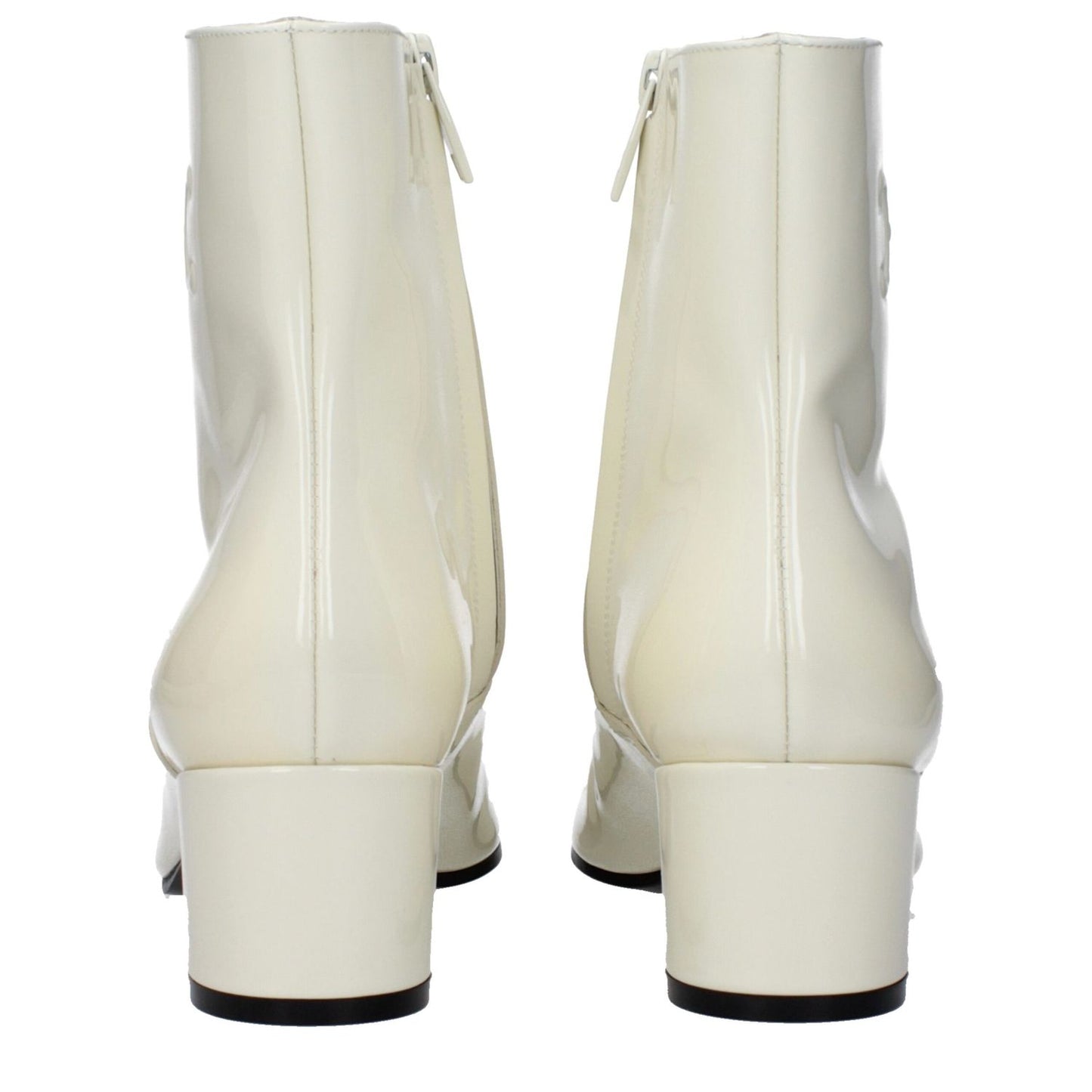 Celine Beige Leather Ankle Boots with mid heels and zip closure, featuring a side logo and round toe, view from the back.