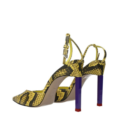The Attico Yellow Leather Pumps with snake print design, buckle closure, and high heels, featuring a pointy toe and leather sole.