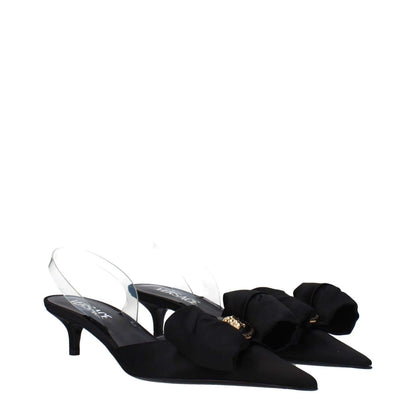 Versace Black Satin Flat Sandals with pointy toe, leather sole, and mid heels featuring stylish bow front detail.