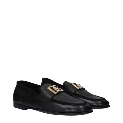 Dolce & Gabbana Black Leather Slip-On Loafers with front logo, round toe, and low flat heel in new collection.