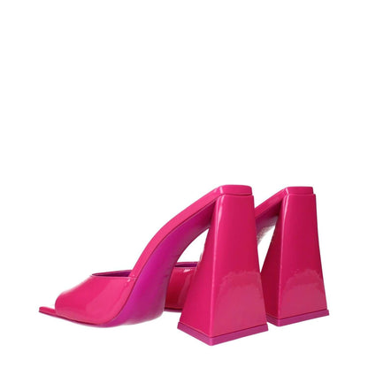 The Attico Pink Leather Platform Sandals in fuchsia patent leather featuring a bold geometric heel design.