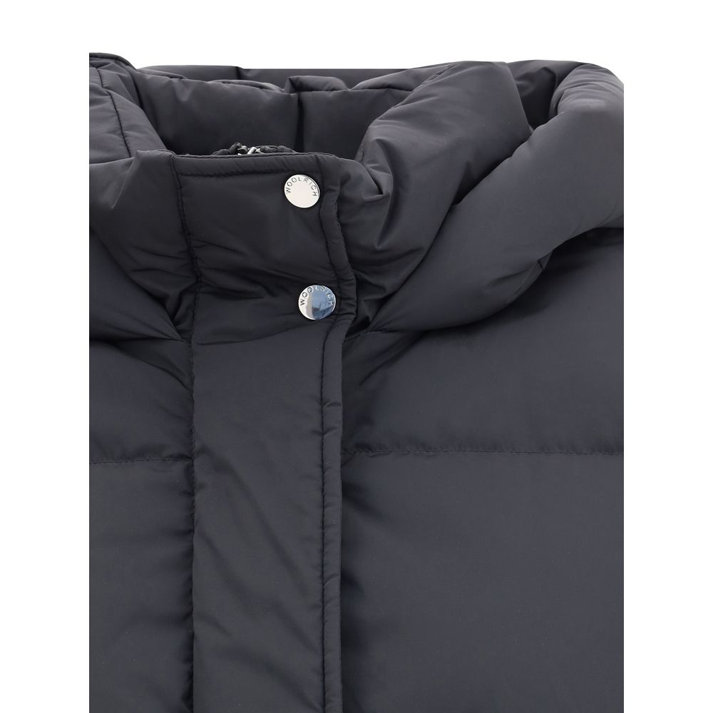 Close-up of Woolrich Black Goose Down Coat with hood and button details, showcasing the padded quilted design.