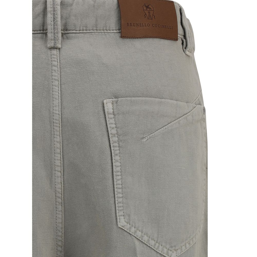 Close-up of Brunello Cucinelli Bicolor Cotton Relaxed Fit Jeans with leather patch and pocket details.