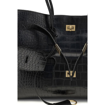 Close-up of Balenciaga Black Calf Leather Bos Taurus Shoulder Bag with gold hardware and crocodile-effect design.