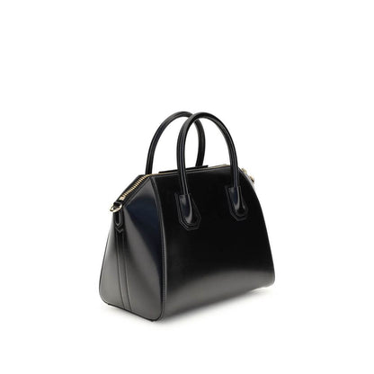 Givenchy Black Calf Leather Bos Taurus Handbag with gold accents and adjustable strap, showcasing luxury and practicality in design.