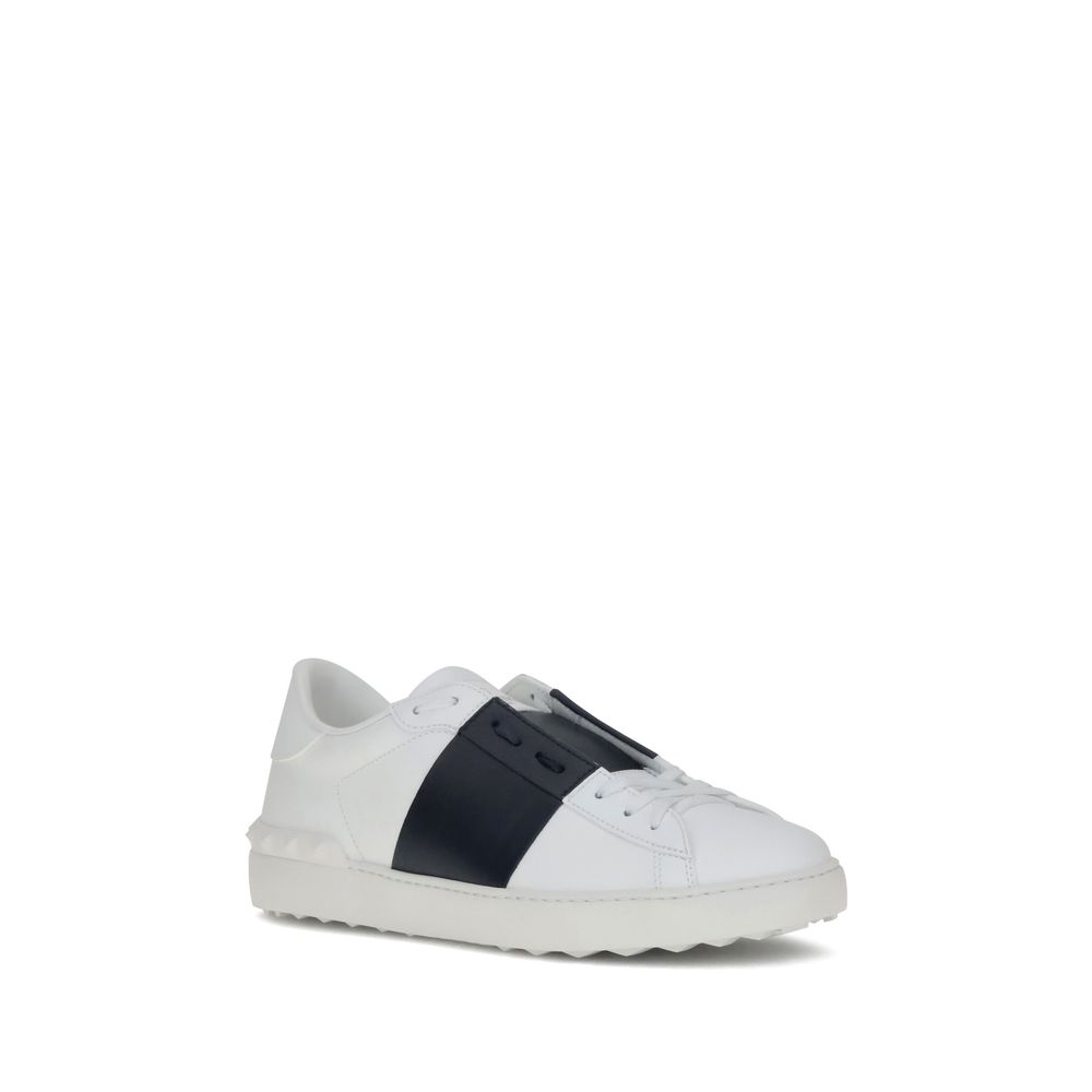 Alt Tag: Valentino Garavani White Calf Leather Bos Taurus Low Top Sneakers with contrasting side bands and studded heel.