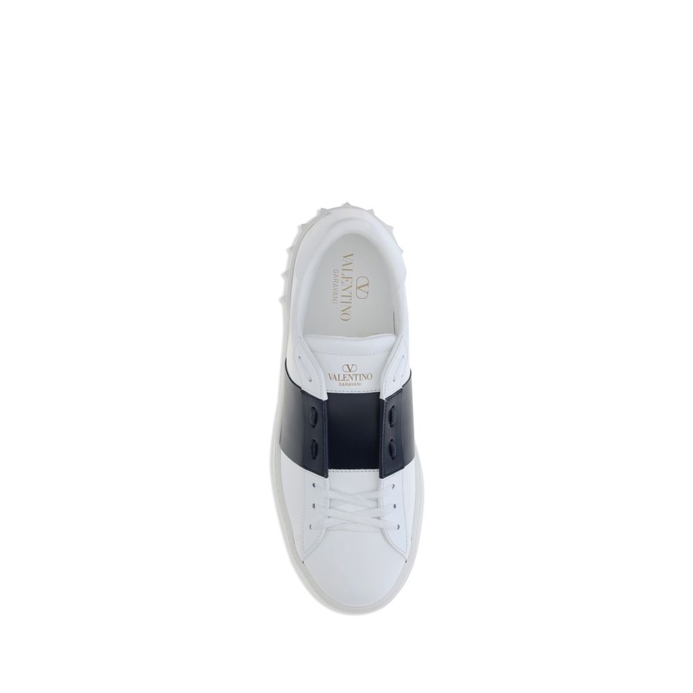 Valentino Garavani White Calf Leather Bos Taurus Low Top Sneakers with contrasting side bands and studded heel, top view.