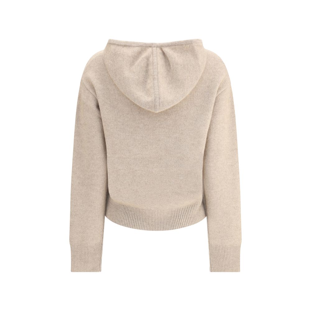 Guest in Residence Beige Cashmere Hoodie featuring ribbed hem and cuffs, adjustable hood, providing a relaxed, sophisticated style