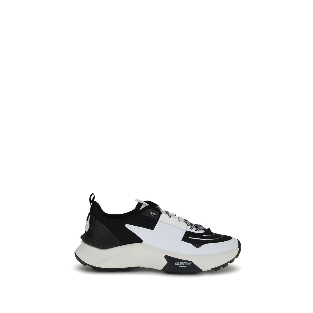 Valentino Garavani Multicolor Calf Leather Bos Taurus Athletic Sneakers, side view with distinctive studded sole detailing.