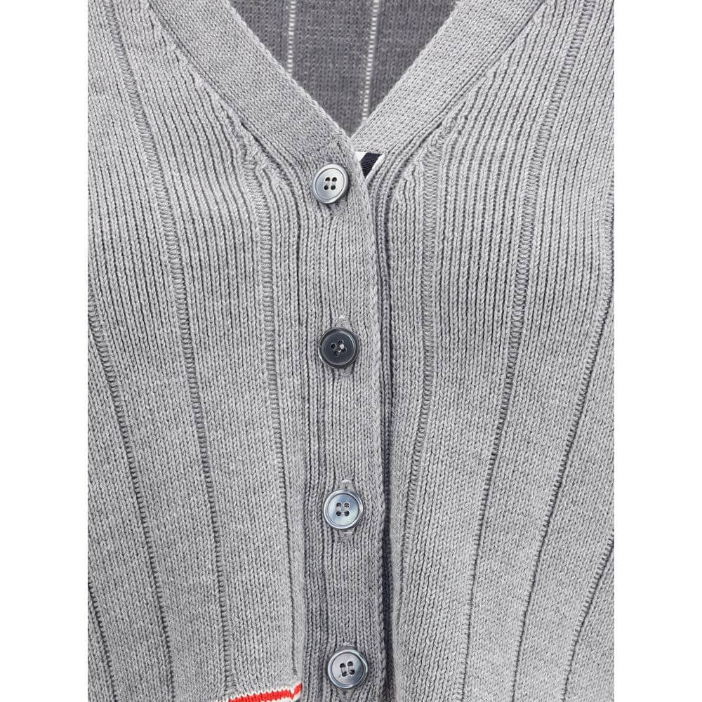 Thom Browne Gray Fleece Wool Cardigan with ribbed design and button closure, featuring iconic colored bands on hem and cuffs.