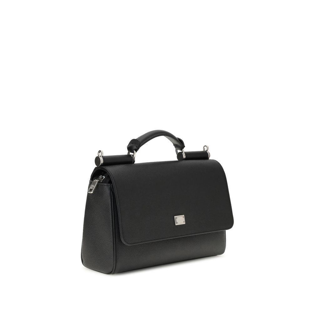 Front view with bag zipped and handles upright.