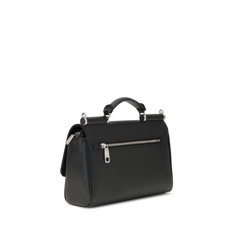 Front view with bag zipped and handles upright.