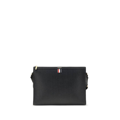 Thom Browne Black Calf Leather Bos Taurus Clutch Bag with tricolor detail and adjustable strap, made in Italy, AW25 collection.