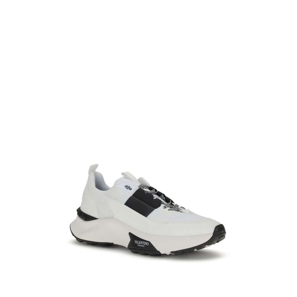 Valentino Garavani White Calf Leather Bos Taurus Athletic Sneakers with rubber sole and logo detailing.
