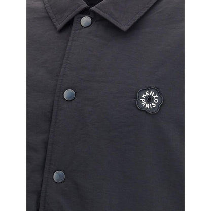 Close-up of Kenzo Black Nylon Bomber with Boke Flower 2.0 logo, showcasing matte polyester texture and metal button details.