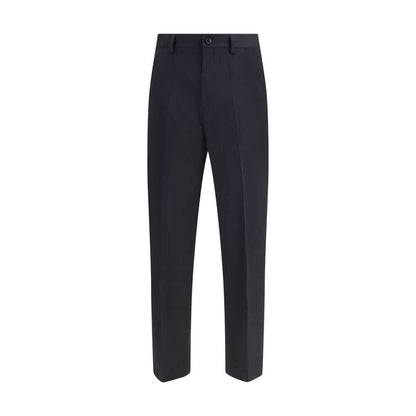 Our Legacy Black Fleece Wool Chino Pants with a classic straight leg, belt loops, and pockets, ideal for casual or formal looks.