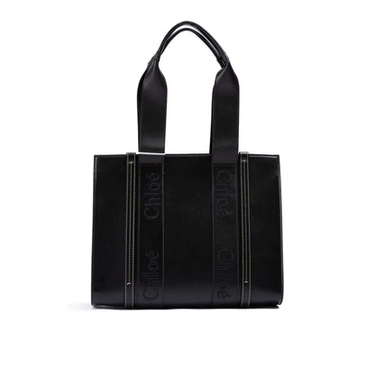 Chloé Black Woody Embroidered Logo Leather Medium Tote Bag, luxury handbag with embroidered logo and leather finish, sustainable fashion.