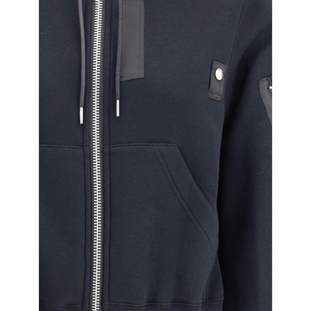 Front view with bag zipped and handles upright.