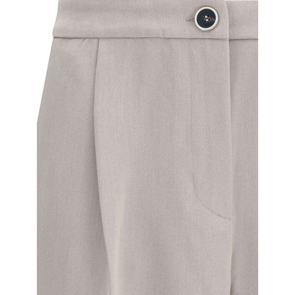 Close-up of Cruna Beige Polyester Casual Pants with button and pocket details, showing modern design and clean silhouette.