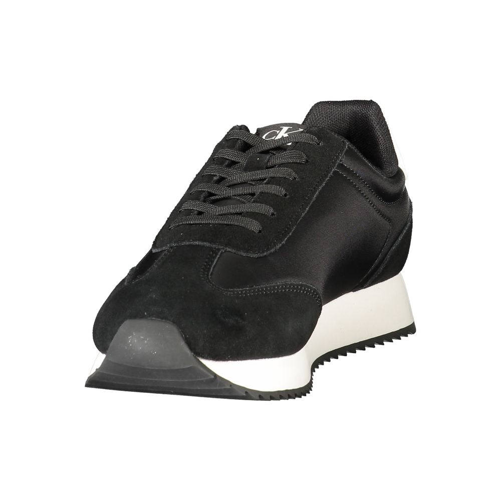 Calvin Klein Black Leather Men Sneaker with white accents and logo, showcasing sleek athletic style.