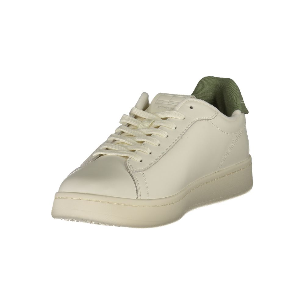 Tommy Hilfiger White Leather Men Sneaker with green accents and logo, featuring removable footbed for customizable comfort.