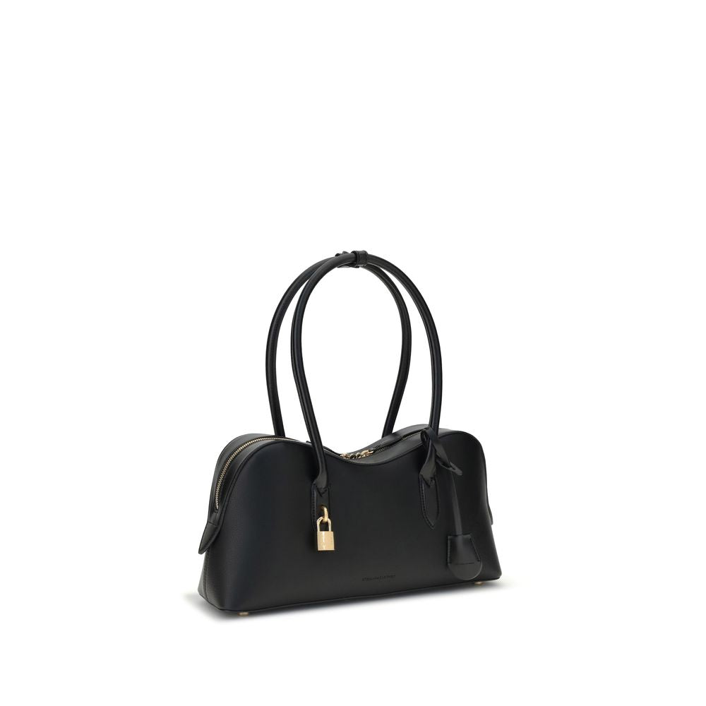 Front view with bag zipped and handles upright.