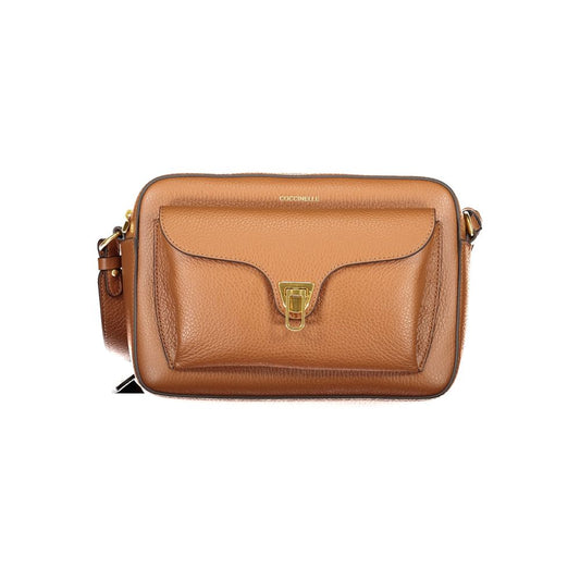 Coccinelle Brown Leather Women Handbag with adjustable strap and twist closure, elegant Italian style and luxury logo.