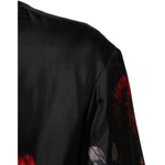 Dolce & Gabbana Black Red Floral Silk Bomber Blouson Jacket with black base and red floral design, close-up view of fabric.