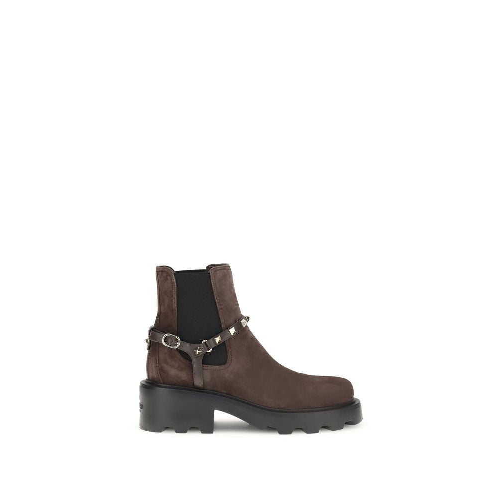 Valentino Garavani Brown Calf Leather Bos Taurus Chelsea Boots with rounded toe, adjustable V buckle strap, and iconic studs.