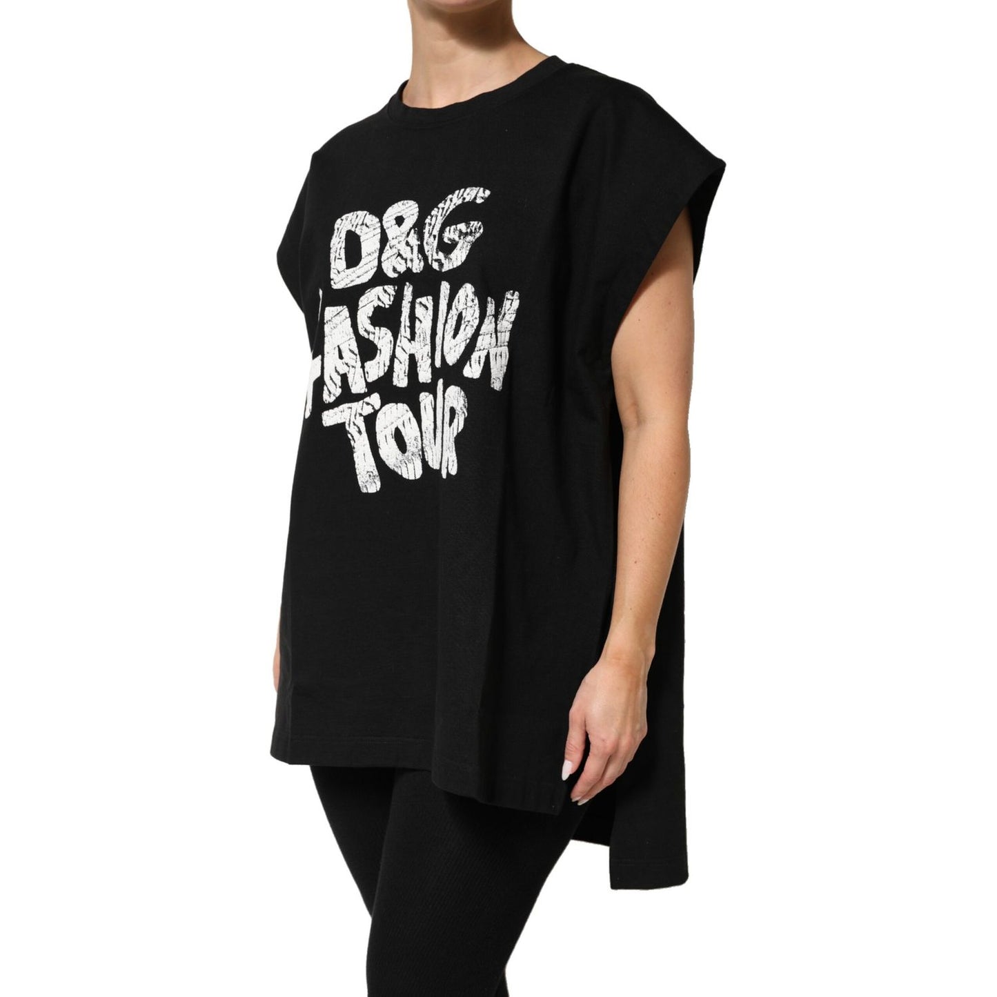 Dolce & Gabbana Black Cotton Sleeveless DG Fashion Top on model, showing bold front graphic from DG Fashion Tour collection.