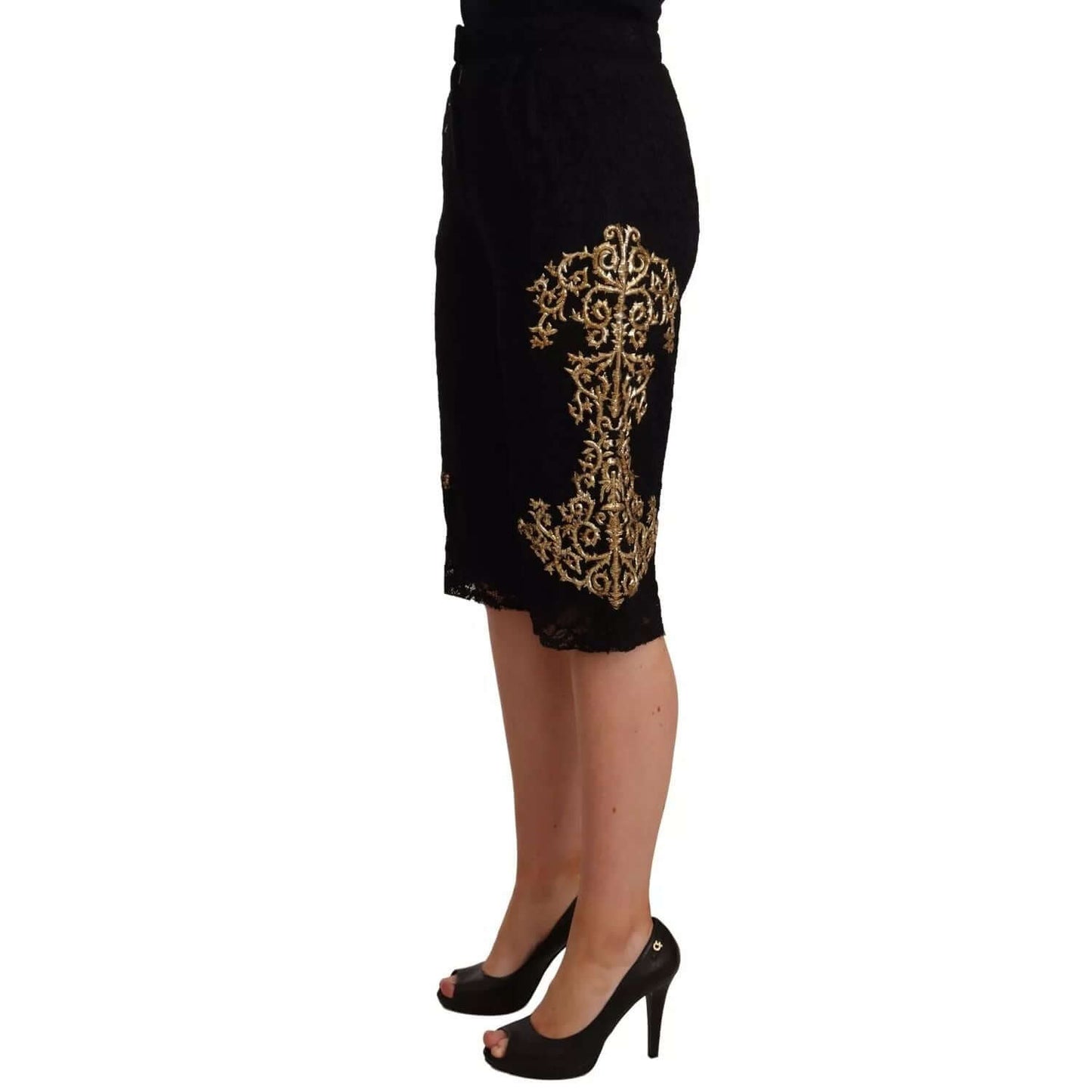 Dolce & Gabbana Black Lace Gold Baroque SPECIAL PIECE Shorts with intricate embroidery, exclusive Italian design. Model wearing heels.
