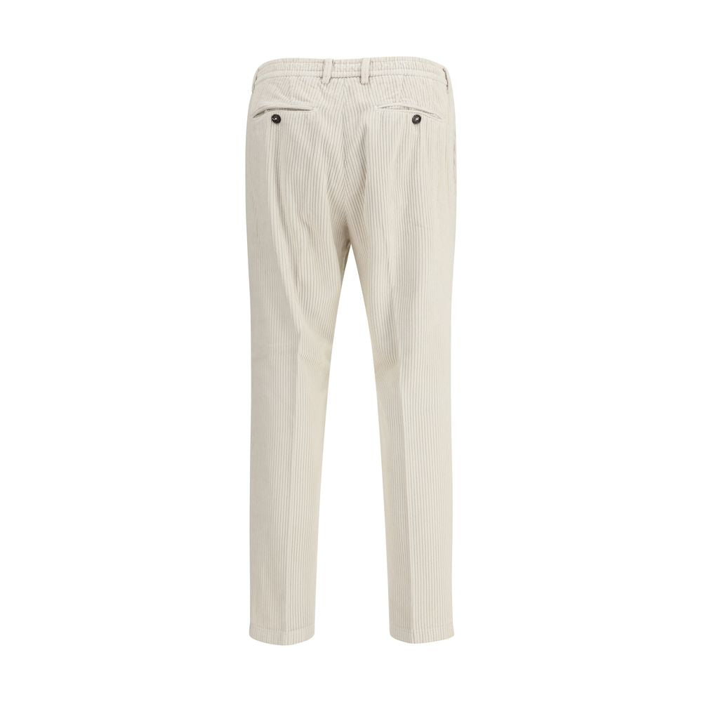 Cruna White Cotton Casual Pants with corduroy texture, rear view showcasing slim fit and buttoned pockets, perfect for fall and winter.
