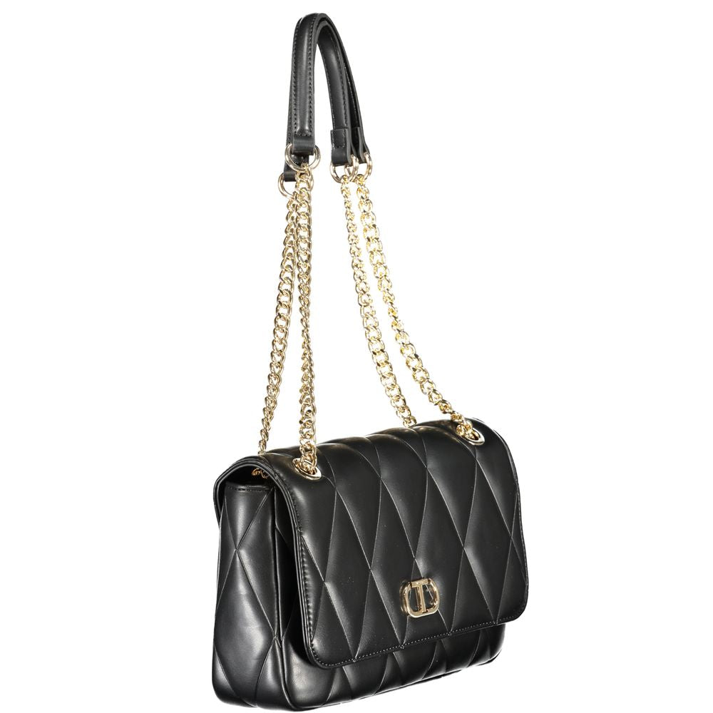 Front view with bag zipped and handles upright.