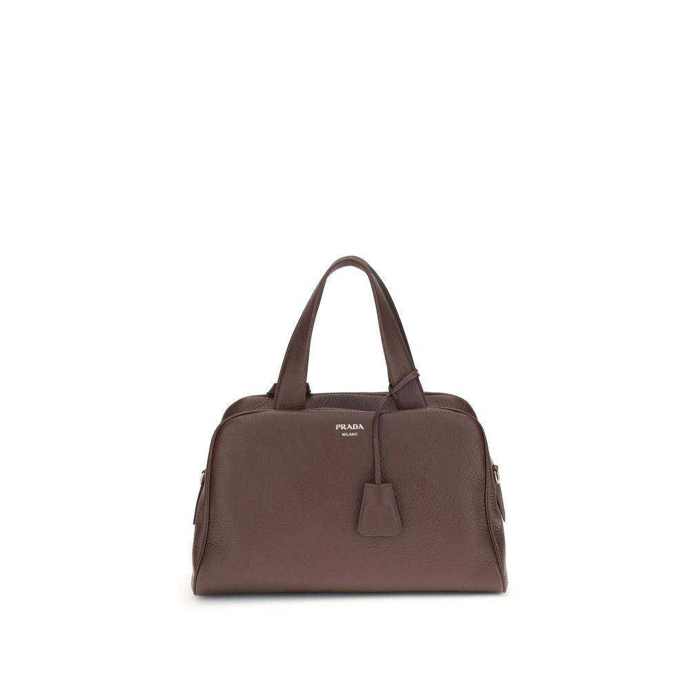 Front view with bag zipped and handles upright.