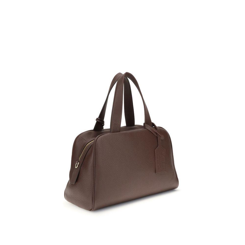 Front view with bag zipped and handles upright.