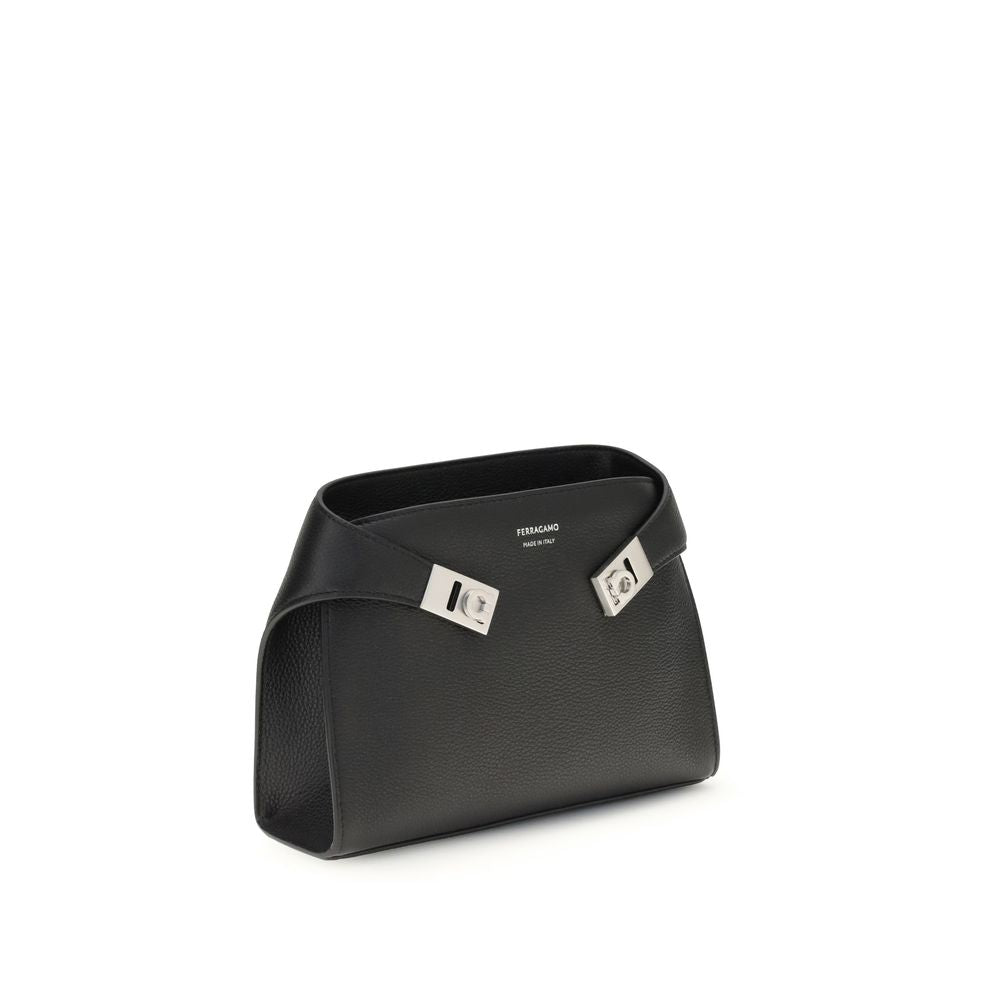 Front view with bag zipped and handles upright.