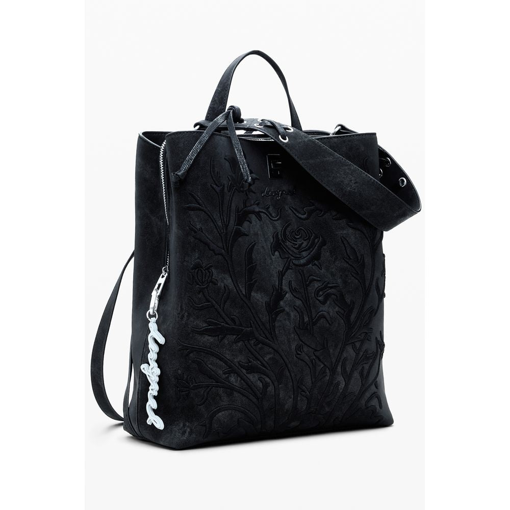Front view with bag zipped and handles upright.
