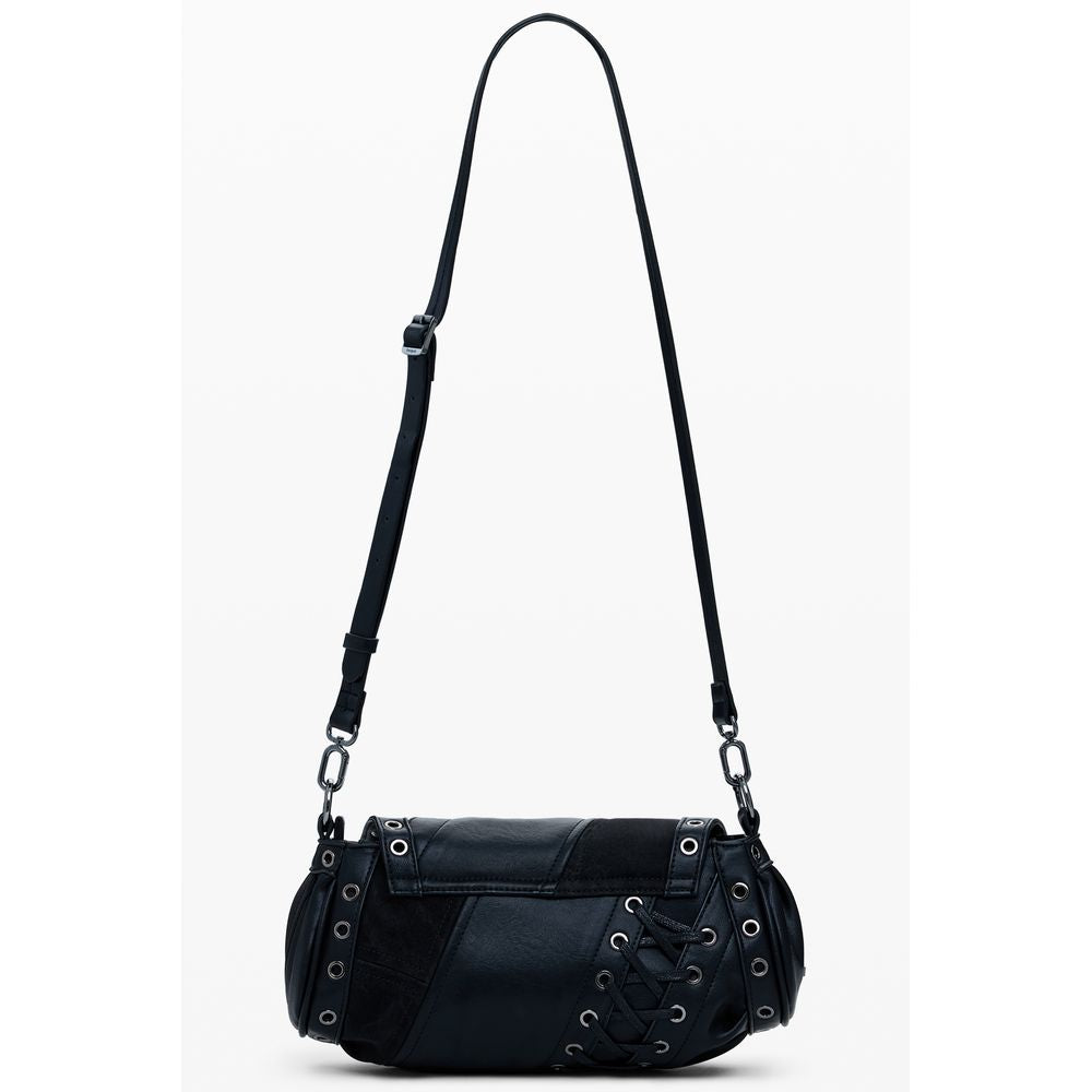 Front view with bag zipped and handles upright.