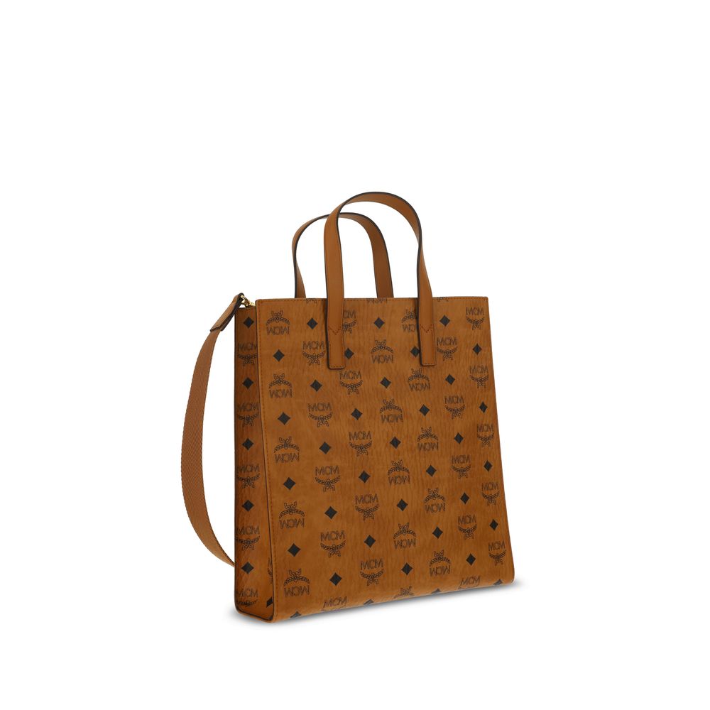 MCM Brown Polyethylene Shoulder Bag with iconic brand monogram pattern, double handles, and adjustable strap, 27x27x8 cm.