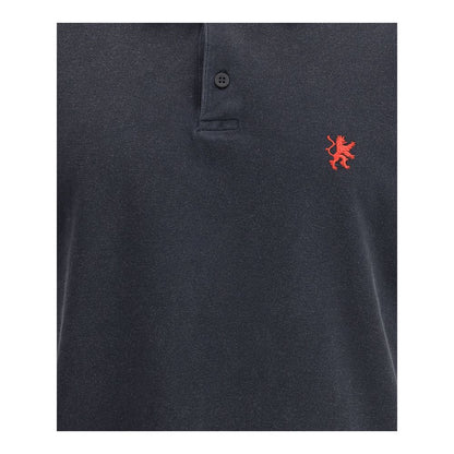 Close-up of Balenciaga Black Cotton Polo Shirt with embroidered logo and button closure.