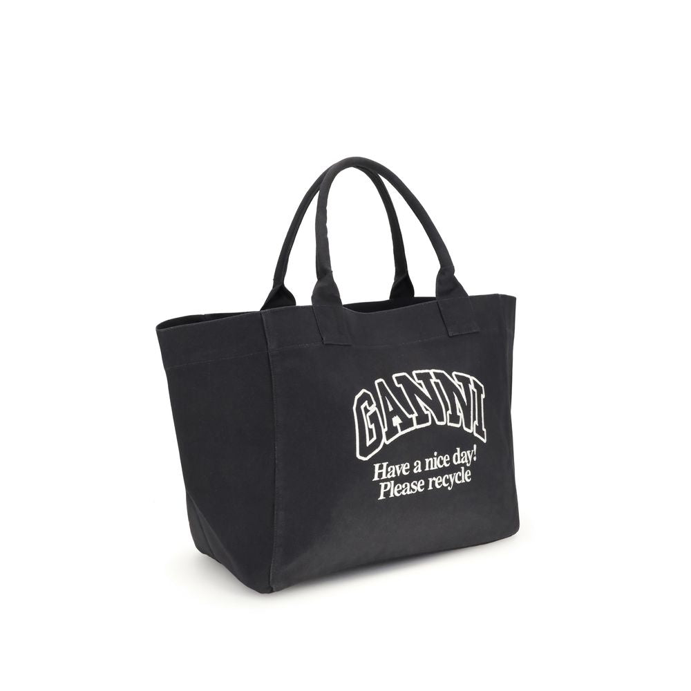 Front view with bag zipped and handles upright.