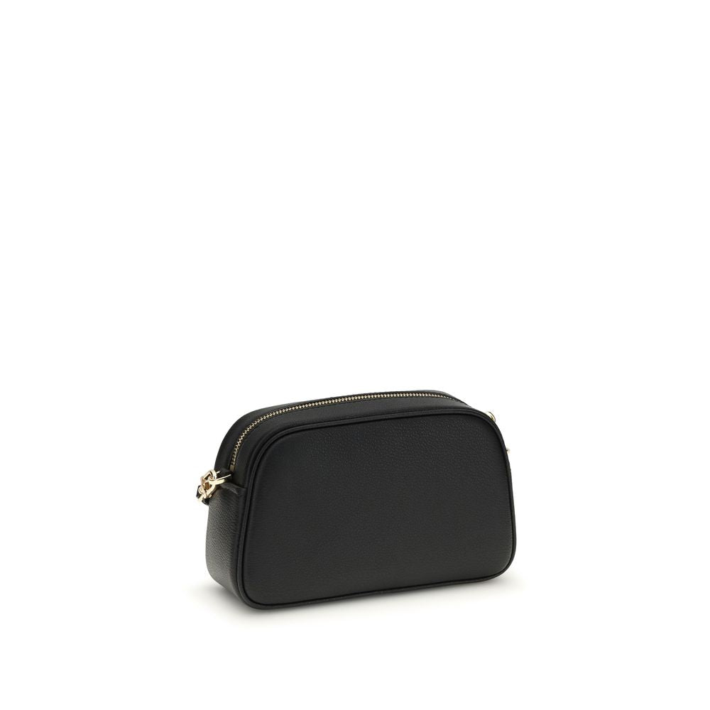 Front view with bag zipped and handles upright.