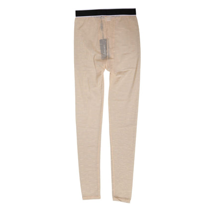 Dolce & Gabbana Beige Nylon Logo Lace Leggings Pants Underwear with lace pattern and DG logo waistband in vibrant beige color.