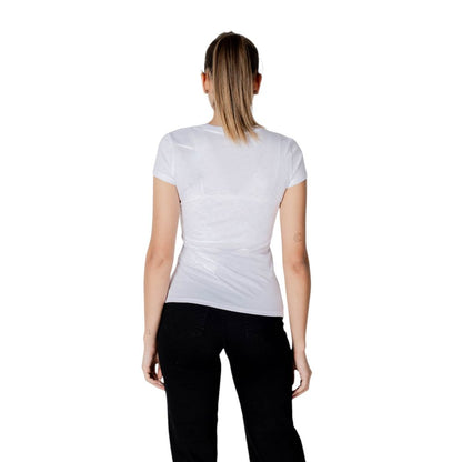 Back view of woman wearing Armani Exchange White Cotton T-Shirt, showcasing modern fit with short sleeves and V-neckline.