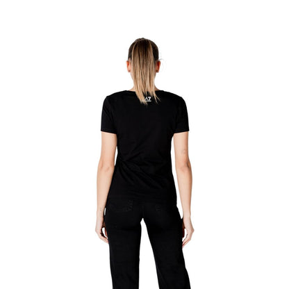 Back view of woman wearing EA7 Emporio Armani Black Cotton T-Shirt, showcasing short sleeves and EA7 logo for casual style.