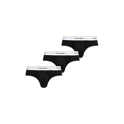 Calvin Klein Underwear Black And White Cotton Briefs, 3-pack, featuring logo waistband and soft cotton blend for comfort and style.
