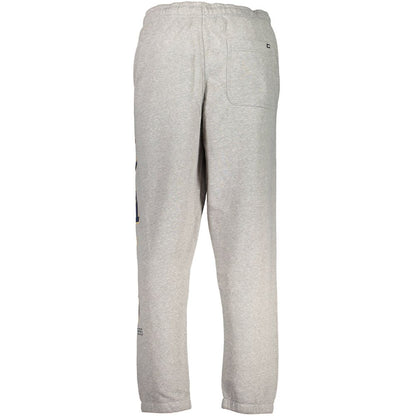 Vans Gray Cotton Pant with elastic waist, fleece material, and logo on pocket. Features elastic ankles and three pockets for sports.
