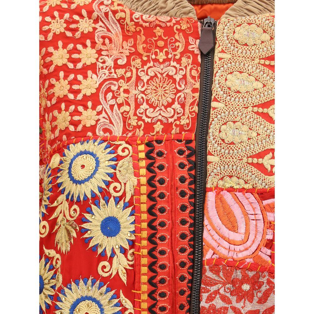 Close-up of Ella Multicolor Cotton Bomber featuring intricate multicolored patchwork and embroidered designs with zip closure.