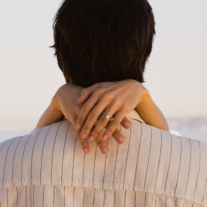 Couple embracing with focus on woman's hand wearing AN JEWELS JEWELRY Mod. AL.RLFY01-9 ring.